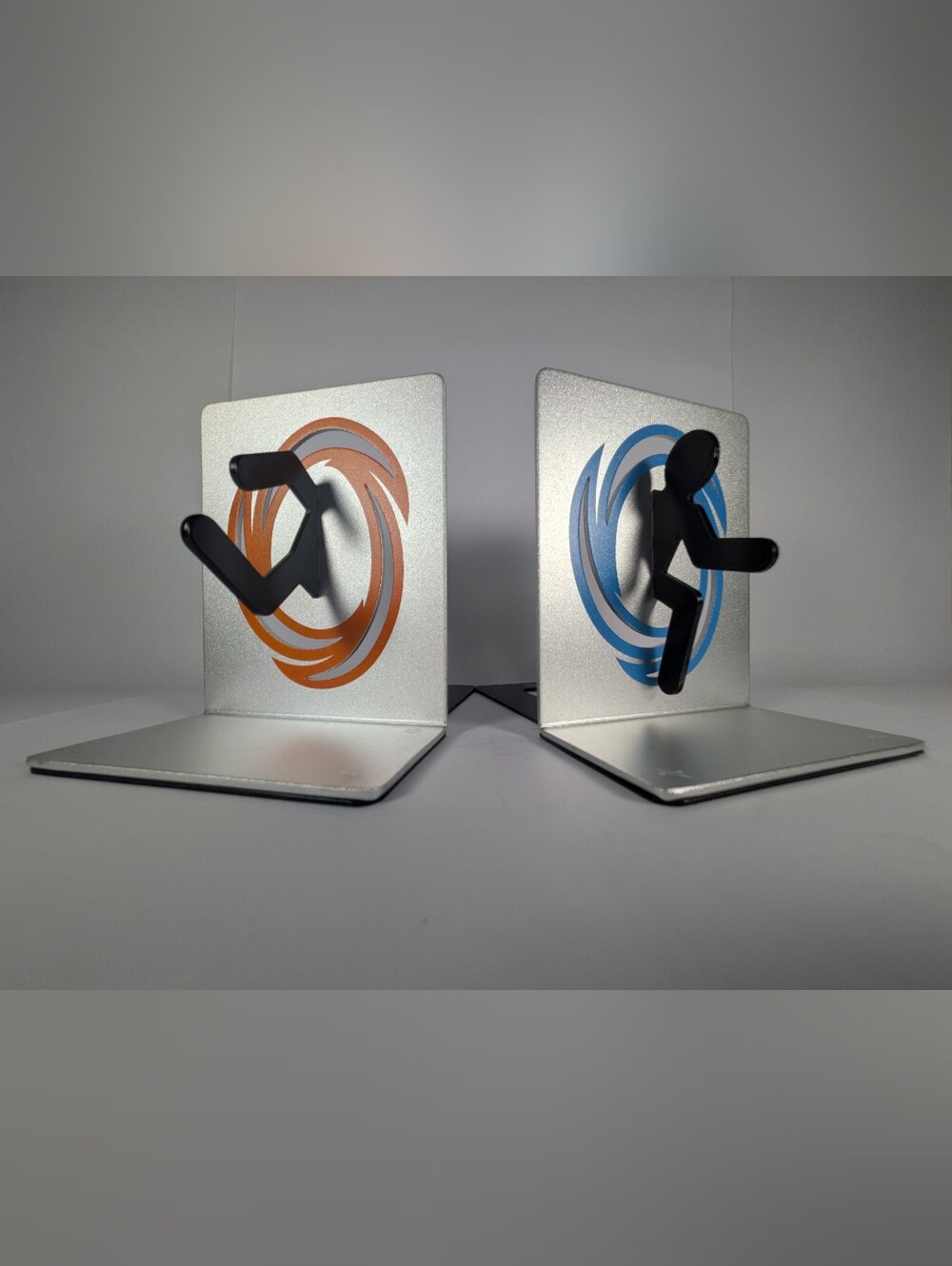 Portal 2 - Heavy Metal Silver Bookends with Blue and Orange Portal Design